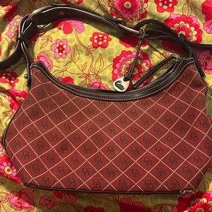 This is an Authentic Dooney and Bourke handbag.